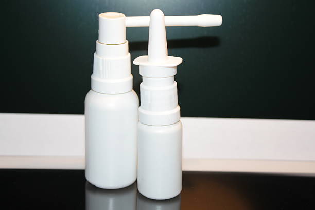 A close up photo of throat and nasal spray medicines